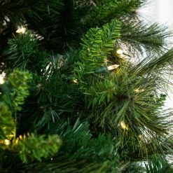 The Christmas Palace CHRISTMAS TREES 12 FT BELGIUM MIX TREE PRE LIT WARM WHITE LED LIGHTS