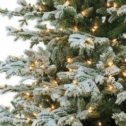The Christmas Palace 9.5 FT VAIL SNOW PINE SLIM TREE PRE LIT WARM WHITE LED CHRISTMAS TREES