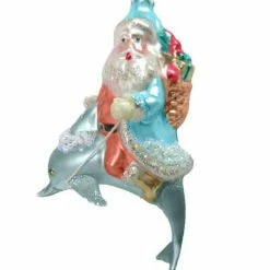 The Christmas Palace Christmas Ornaments DECEMBER DIAMONDS 5" SANTA ON BLUE DOLPHIN ORNAMENT