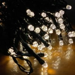 The Christmas Palace CHRISTMAS LIGHTS 60 FT 240 LED WARM WHITE TWINKLE BLACK WIRE BATTERY OPERATED